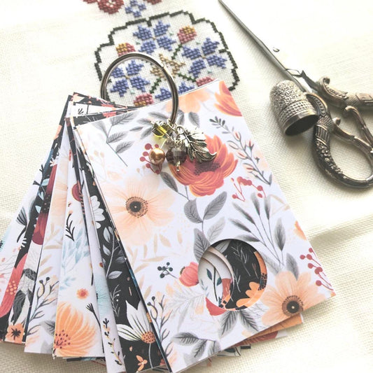 Floral themed floss drops for cross stitch thread organisation.