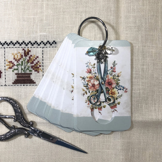 Floral scissor themed floss drops for cross stitch.