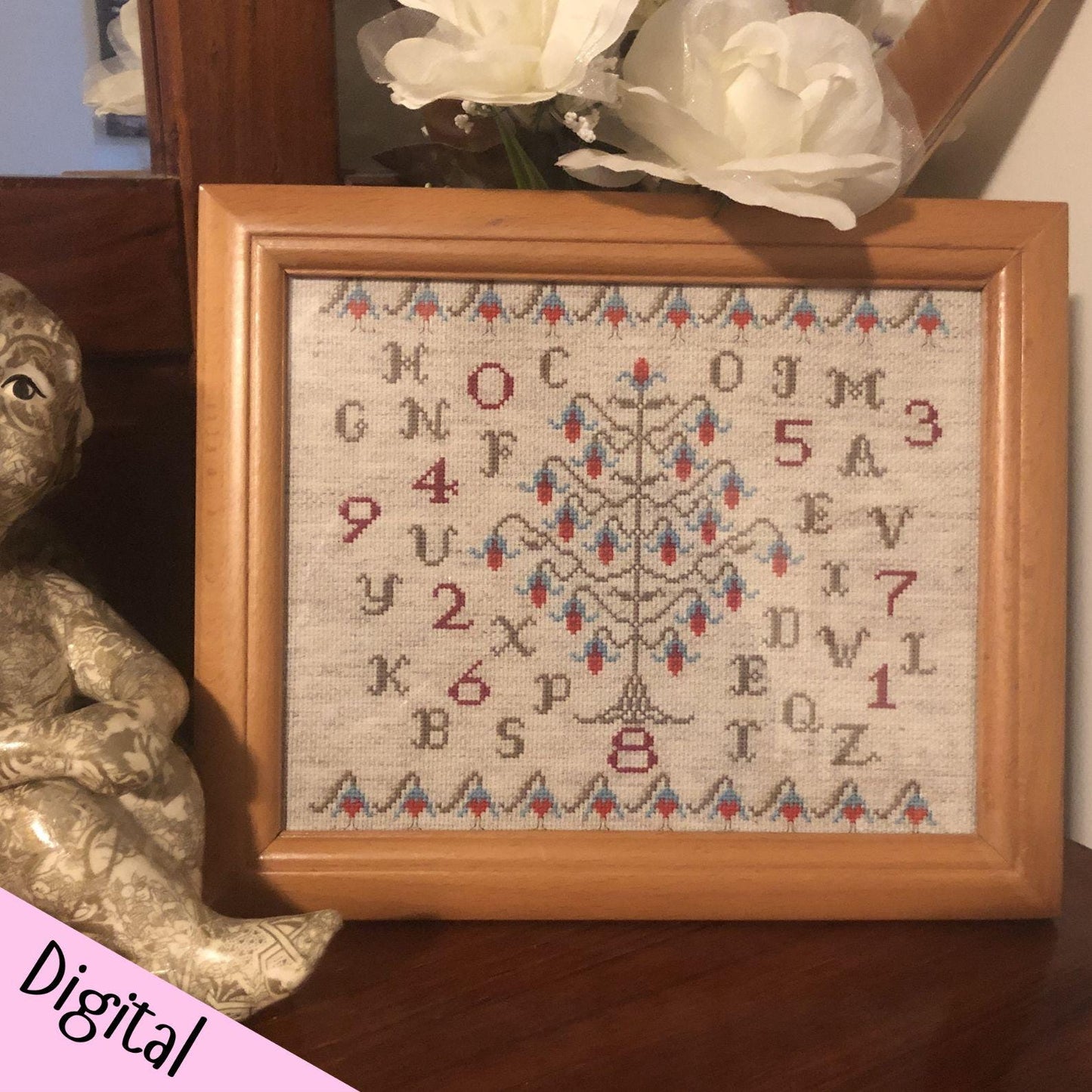 Sampler styled cross stitch pattern