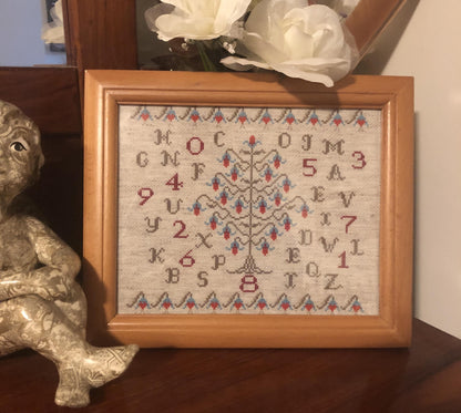 Sampler style cross stitch pattern