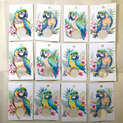 Tropical birds themed floss drops for cross stitch thread organisation.