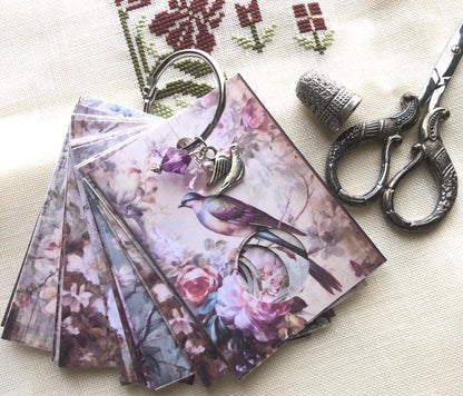 Floral birds floss drops for cross stitch thread organisation.