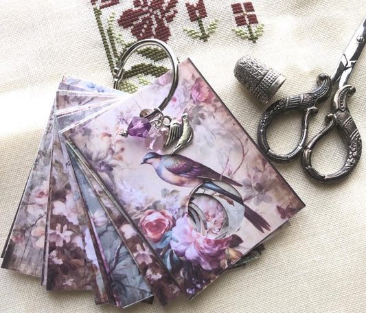 Floral birds floss drops for cross stitch thread organisation.