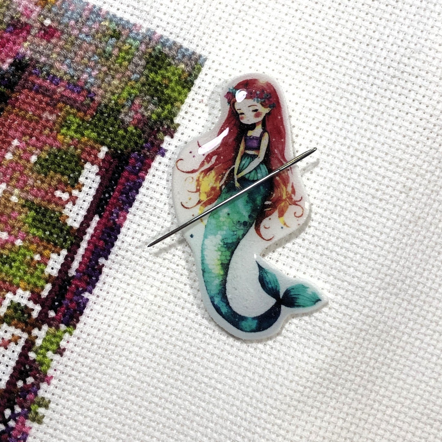 Mermaid magnetic needle minder