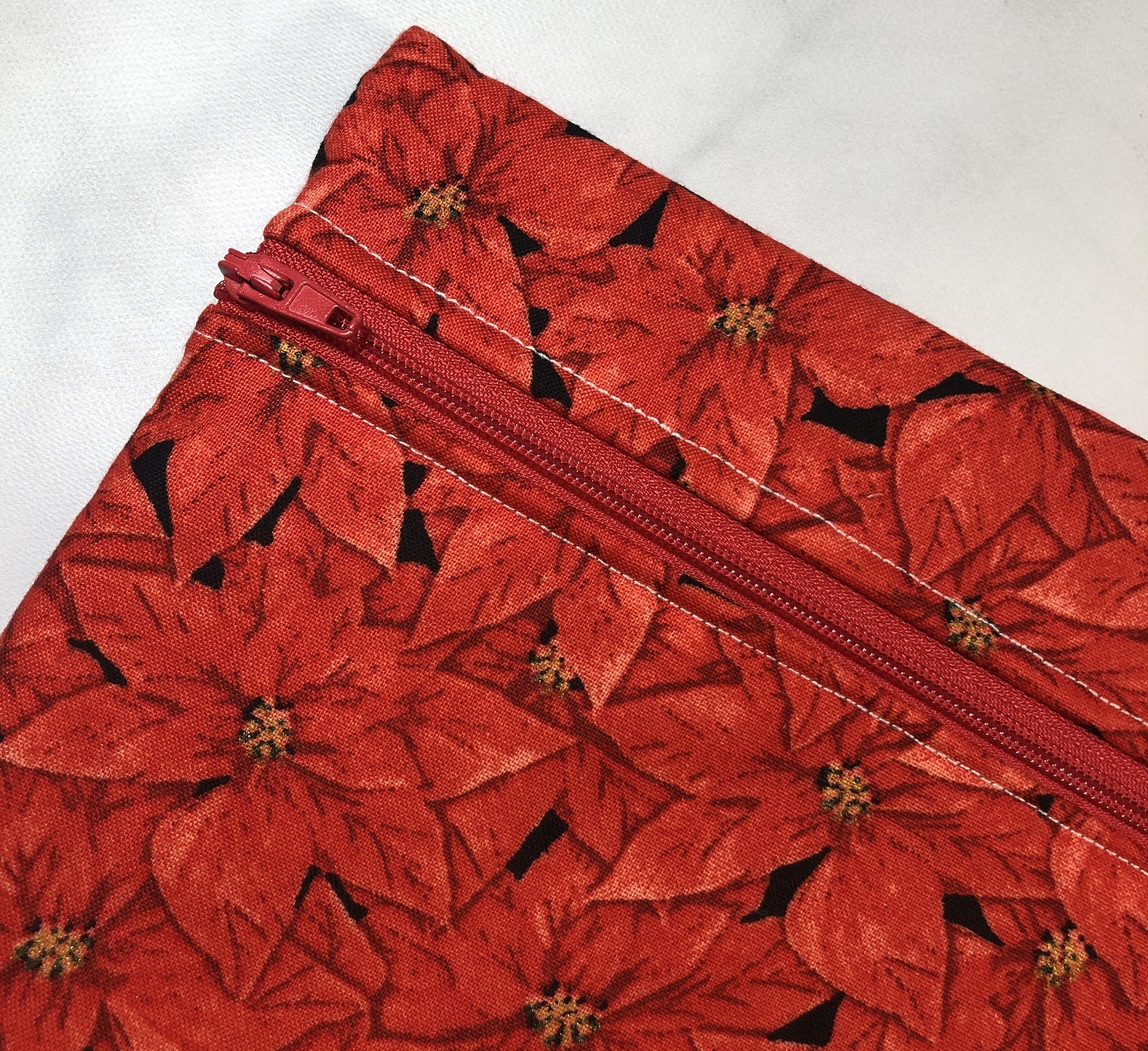 Christmas poinsettia themed cross stitch project bag