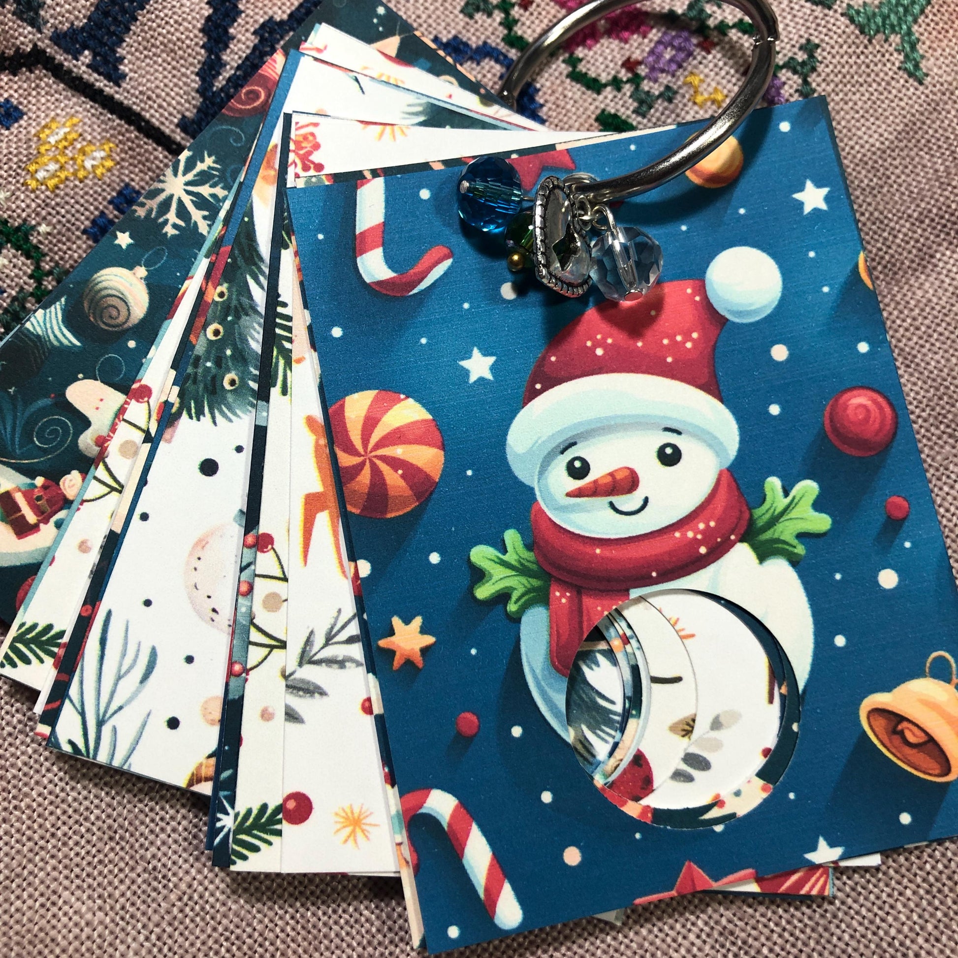 Christmas themed floss drops for cross stitch thread organisation.