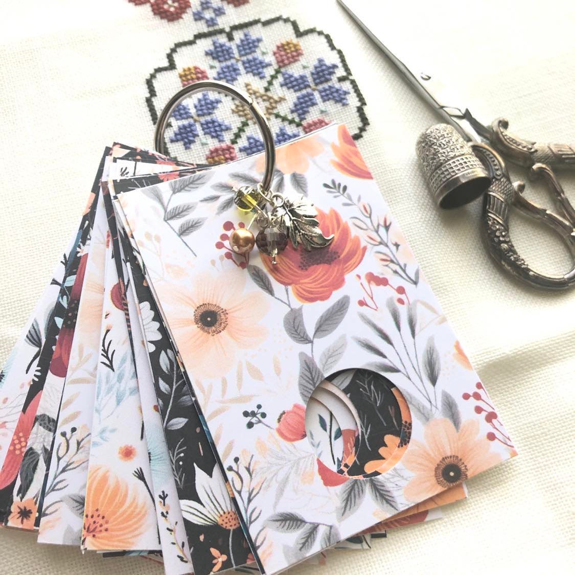 Floral themed  floss drops for cross stitch thread organisation.