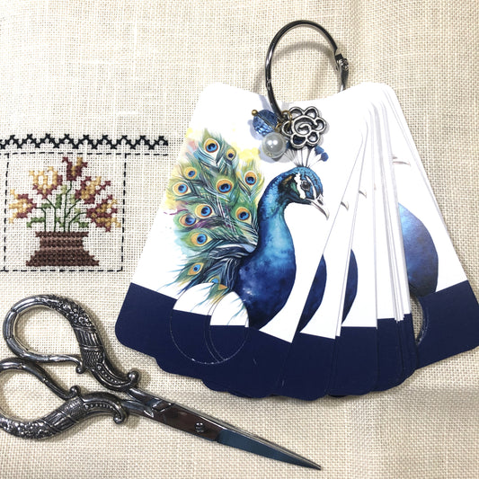 Peacock themed floss drops for cross stitch.