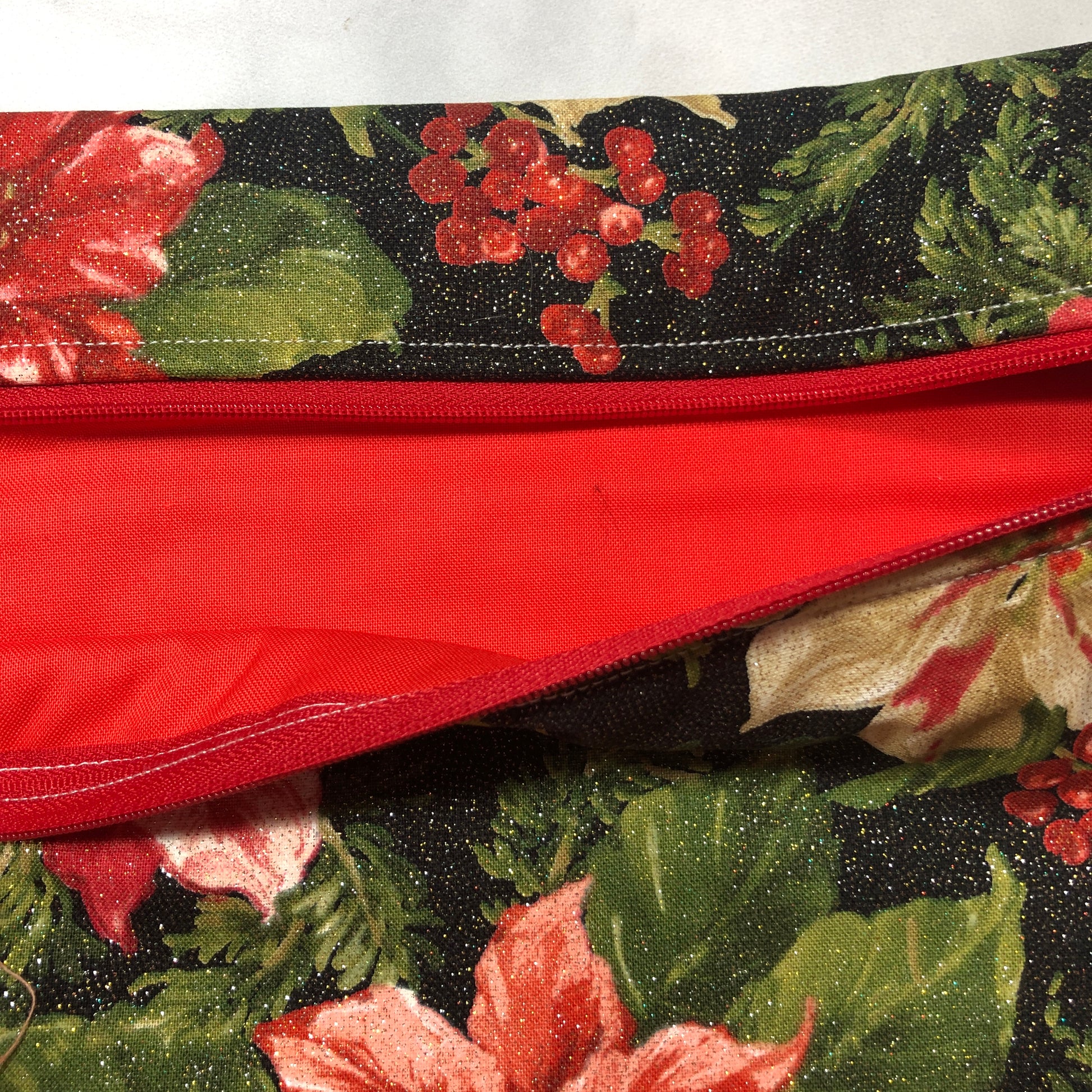 Sparkly Christmas poinsettia themed project bag for cross stitch.