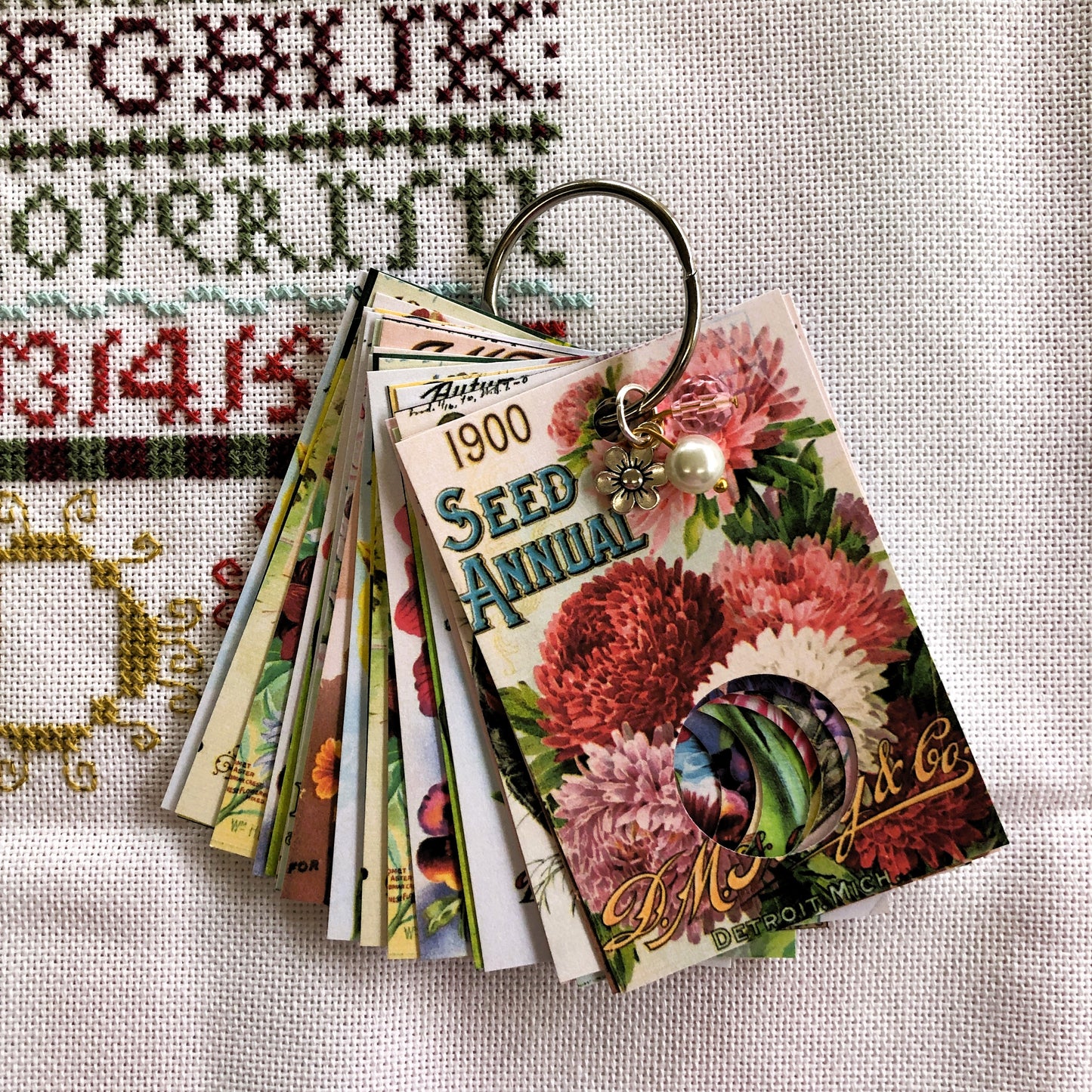 Vintage seed packet themed handmade floss drops for cross stitch.