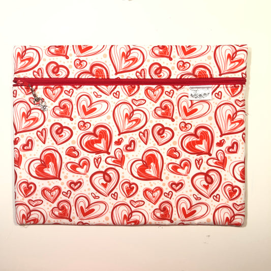 Red heart patterned project bag for cross stitch.