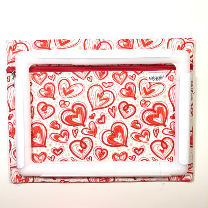 Red heart patterned project bag for cross stitch.