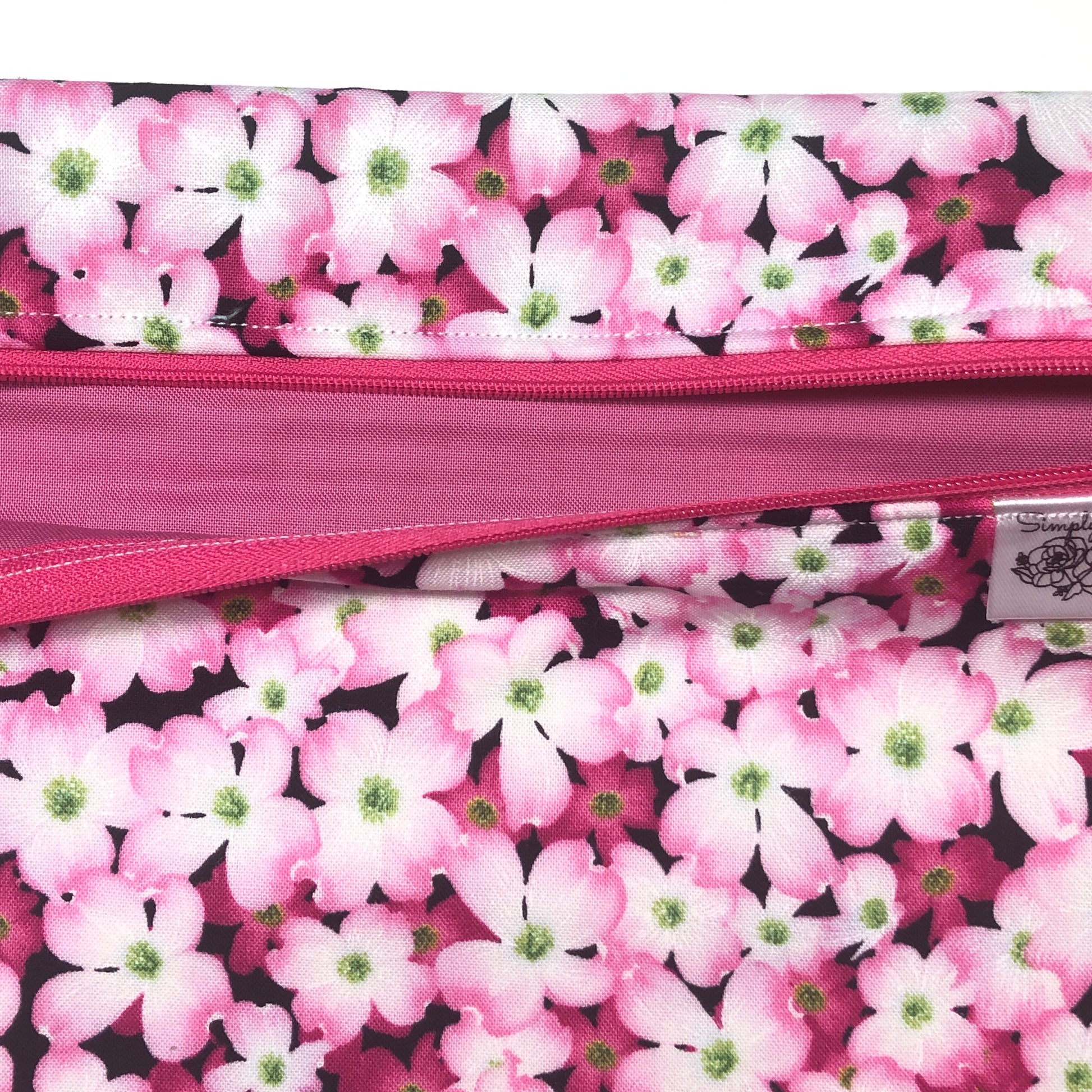 Pink floral project bag for cross stitch.