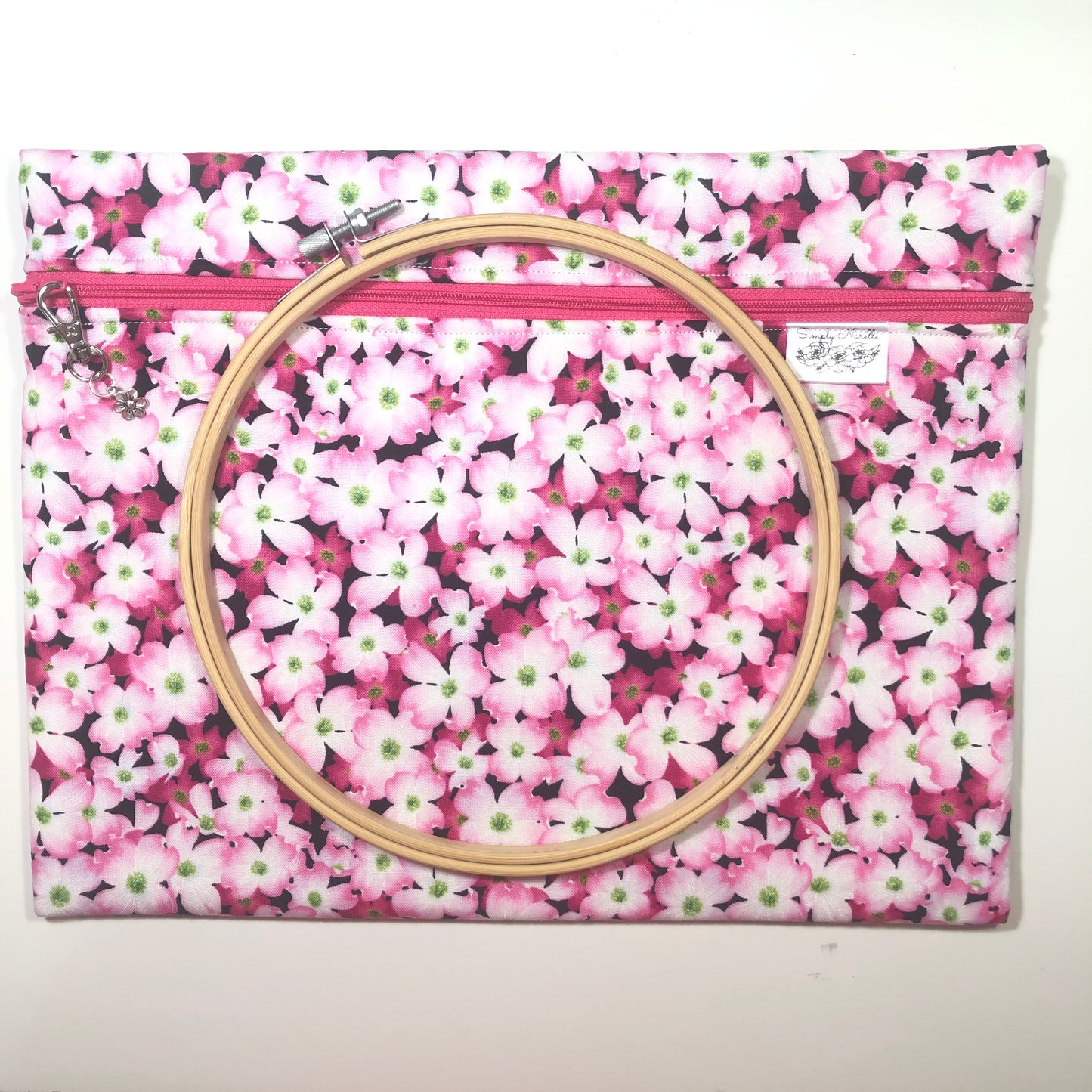 Pink floral project bag for cross stitch.