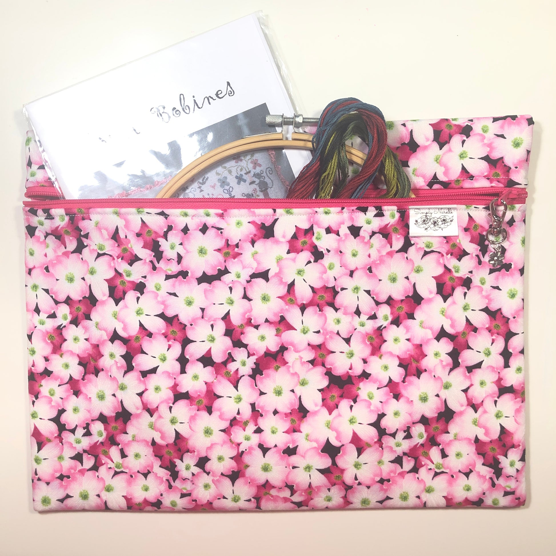 Pink floral project bag for cross stitch.
