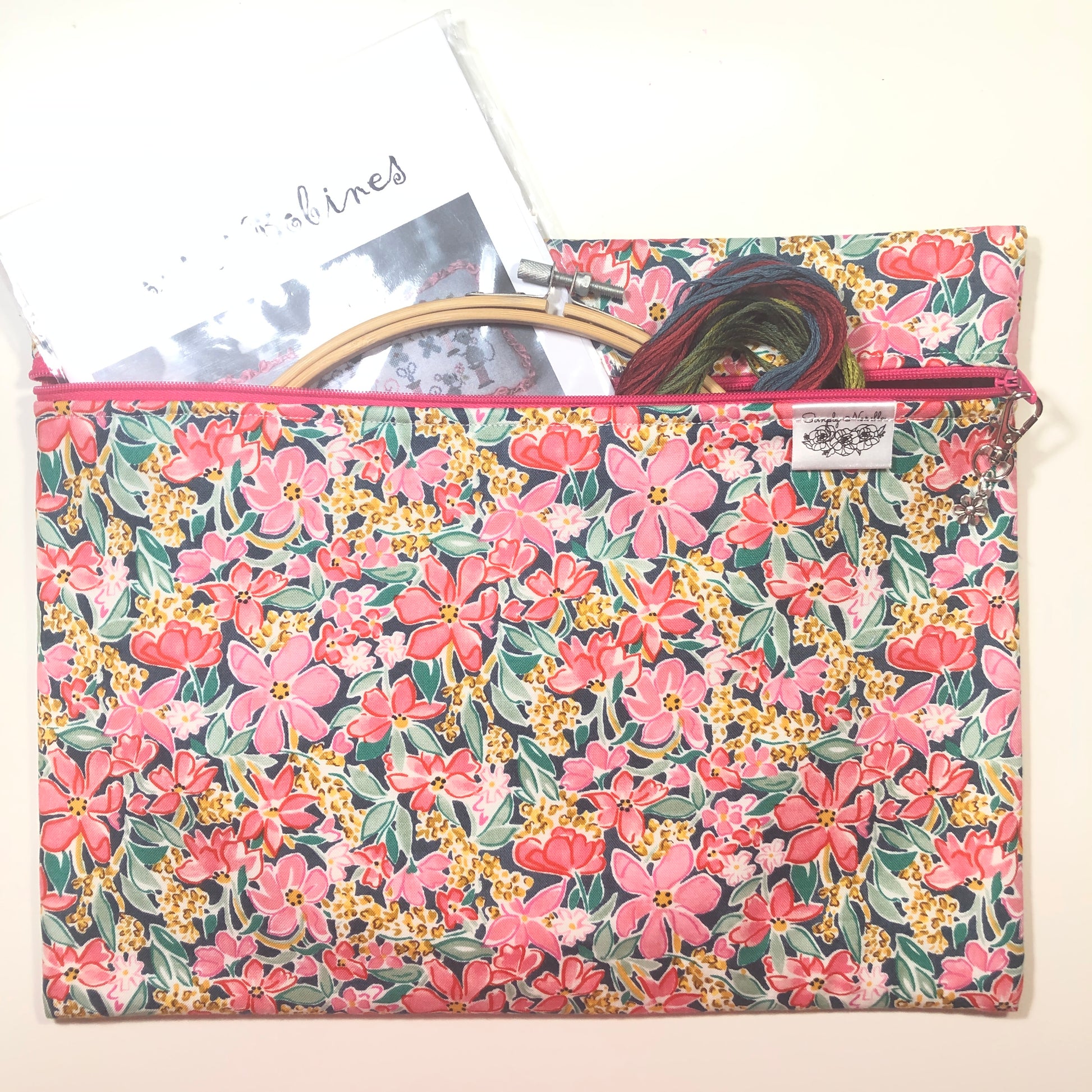 Pink floral cross stitch project bag.