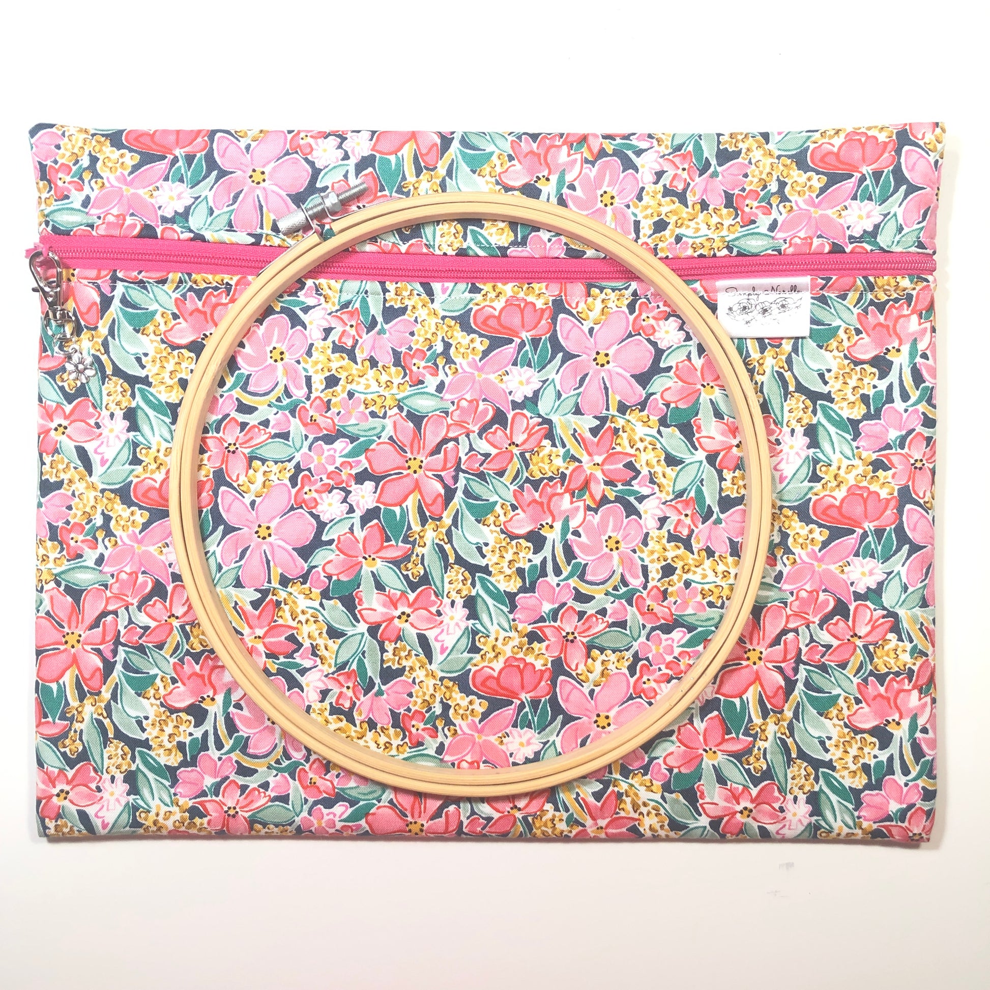 Pink floral project bag for cross stitch.