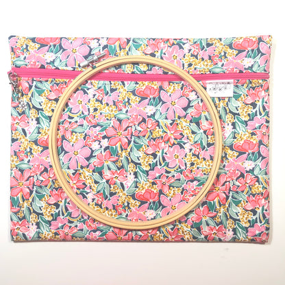 Pink floral project bag for cross stitch.