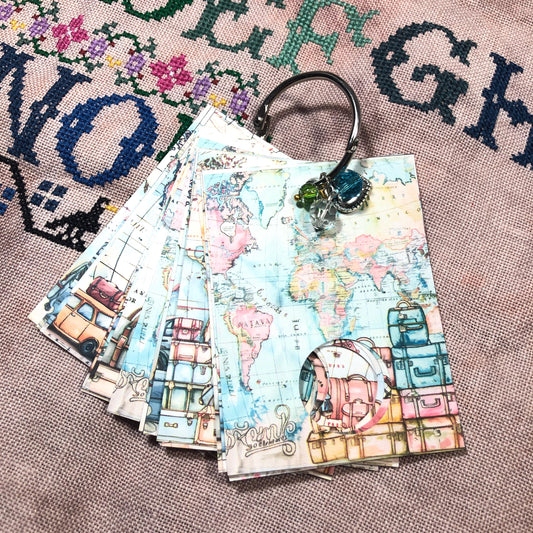 World map themed floss drops for cross stitch thread organisation.