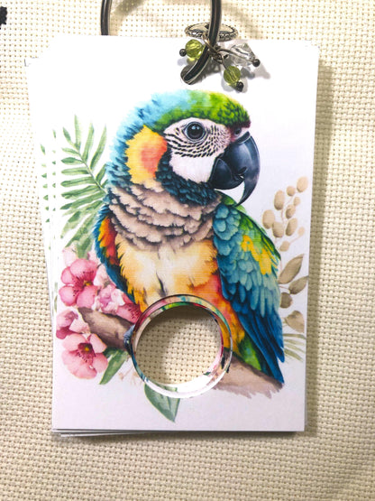 Tropical birds themed floss drops for cross stitch thread organisation.