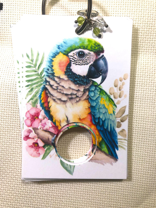 Tropical birds themed floss drops for cross stitch thread organisation.