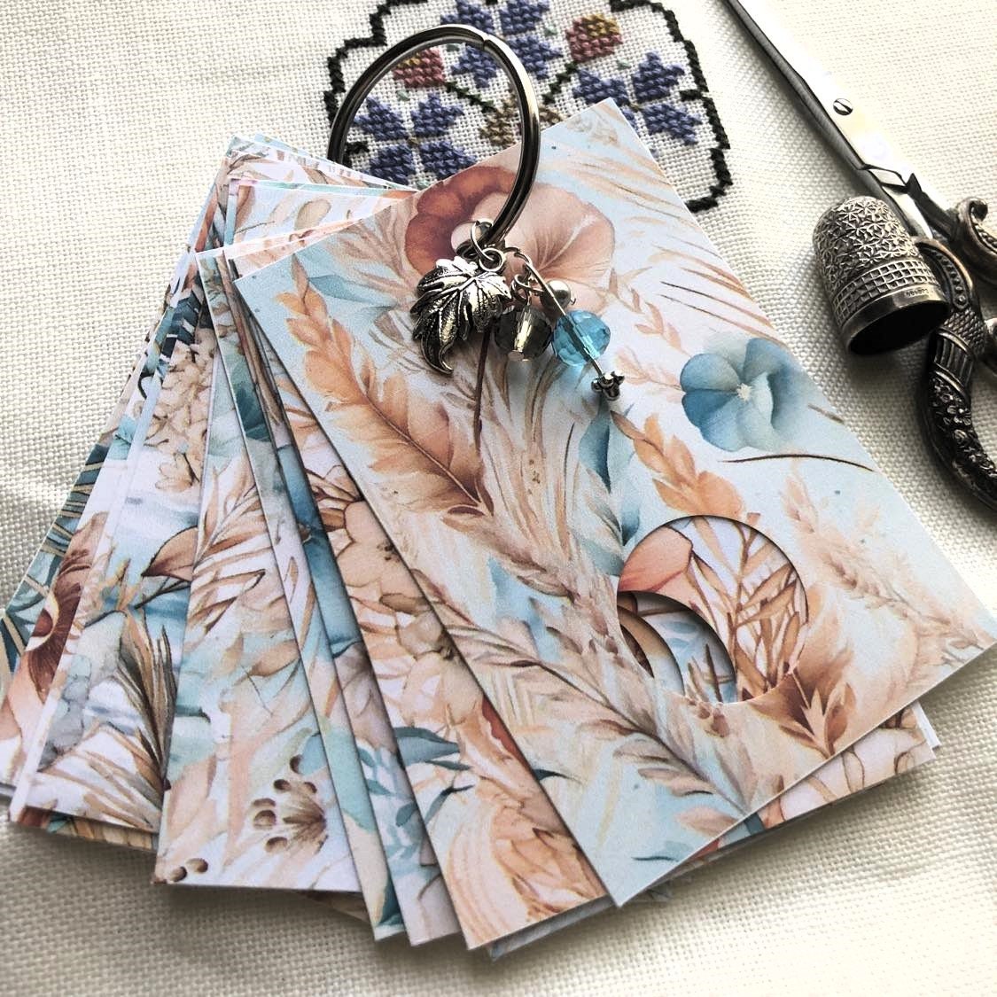 Beach boho themed floss drops for cross stitch thread organisation.