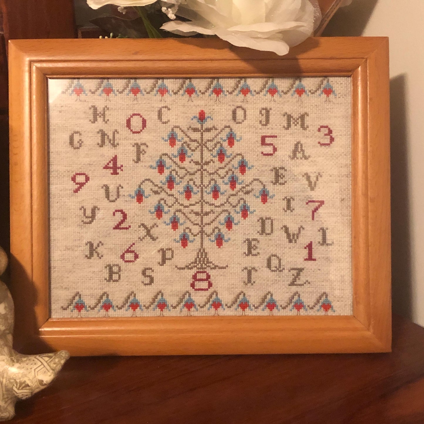 Sampler style cross stitch pattern
