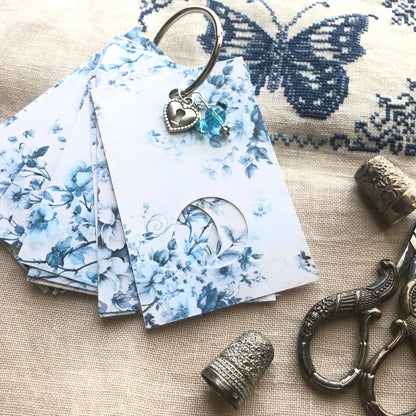 Blue floral themed floss drops for cross stitch thread organisation.